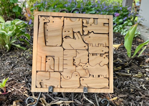 laser cut and engraved wooden puzzle with assorted animals