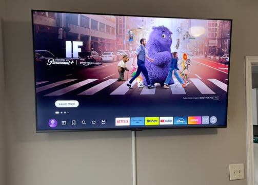 Installing a TV mount with wire covers