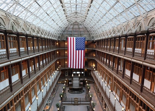 photographer picture of a large atrium with an American flag on the ceiling