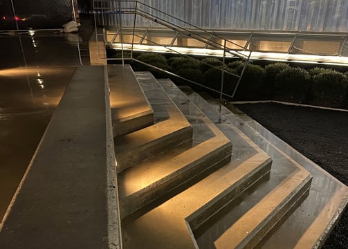 concrete steps illuminated with step lights