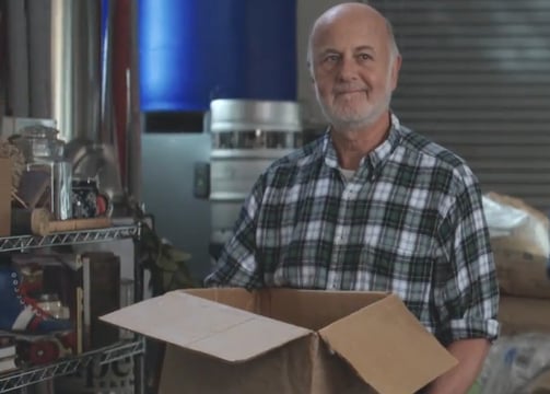 a man holding a box