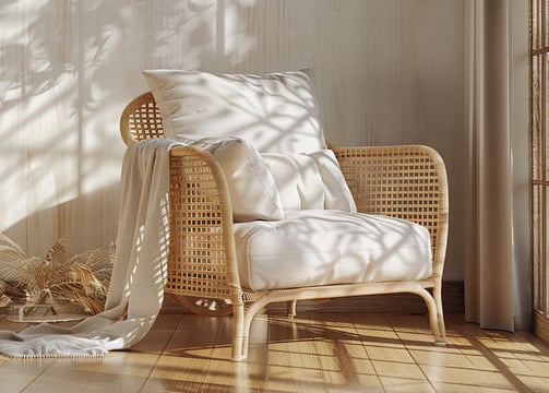 a chair with a blanket on it and a blanket on the floor