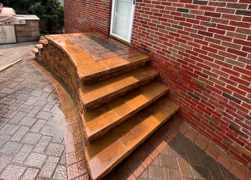 a brick wall with a brick wall and stairs