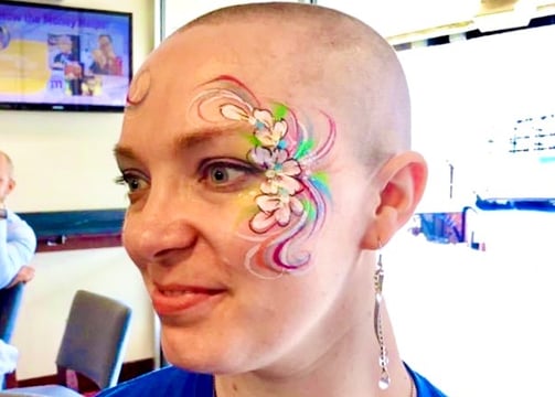 Face Painting Flower Design for a Cancer Survivor Event