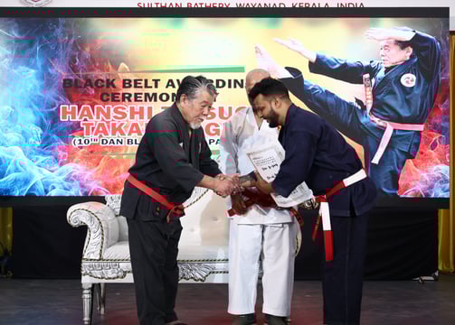 hanshi tetsuo takamiyagi awarding 7th dan to kyoshi lince lince ravi