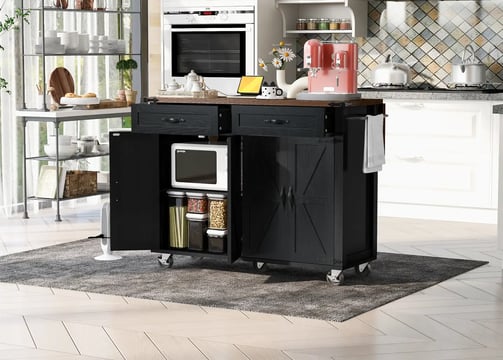 a kitchen island with a microwave and oven