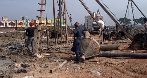 a group of men working on a construction site