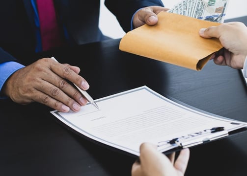 two men getting into a contract of loan against mutual funds showcasing exchange of money against MF