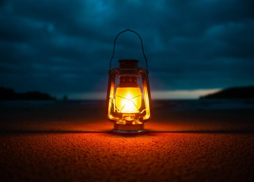 Latern on ground glowing in dark