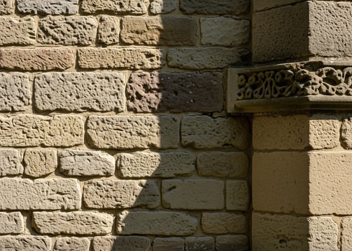 a stone wall crafted by a stone mason