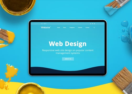 a tablet screen displaying a website design for a website