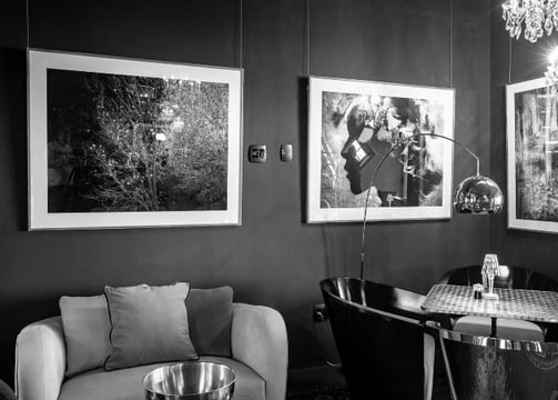 Framed b&w artwork displayed in a modern interior, showcasing picture framing service in Hout Bay