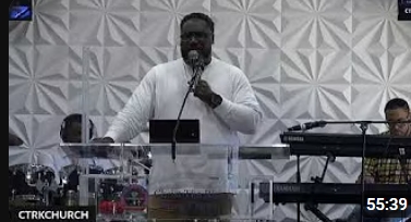 Pastor preaching from the pulpit