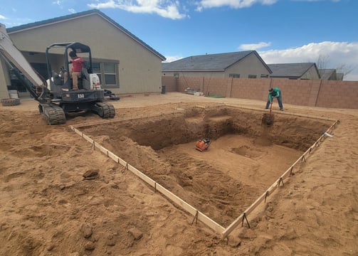 a construction worker is working on a home construction project