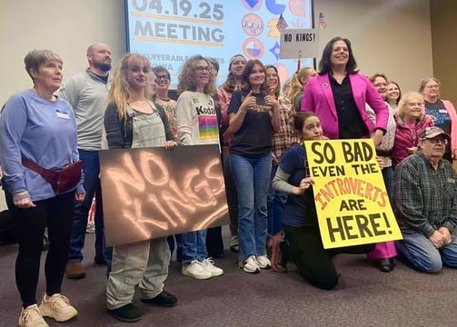 Representative Aime Wichendahl and the Insufferable Wenches of Iowa gather before a protest