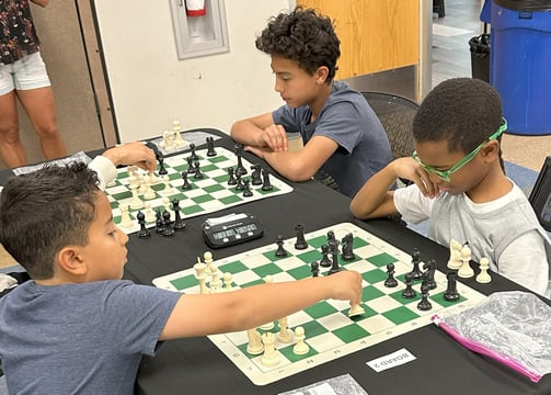 Children playing chess at a practice chess tournament at the Henderson Multi-Gen Rec Center in NV