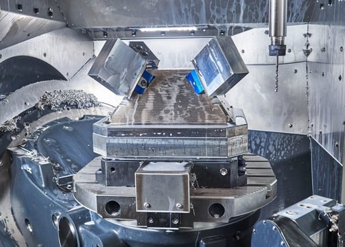 a machine that is making a big hole in the center of a machine