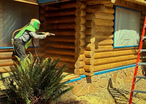 40 years of old stains removed for a fresh coat on this Log Home!