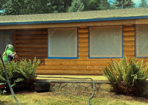 40 years of old stains removed for a fresh coat on this Log Home!
