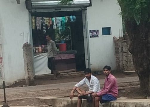 Image of people and shop