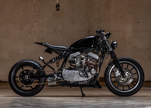 custom black sportster redesigned with turbo engine.