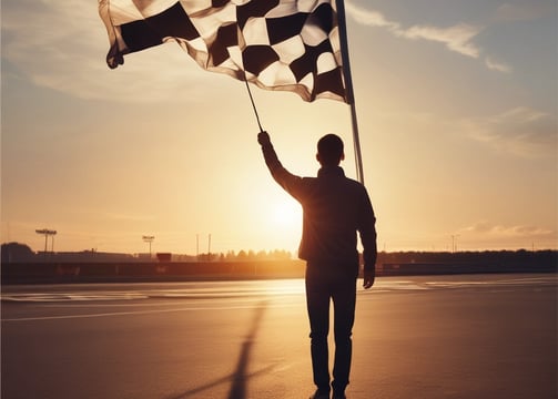 a man holding a checkered checkered flag