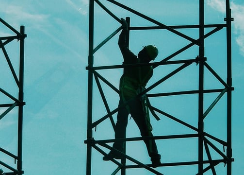 a man on a scaffold