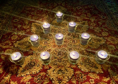 Ten lit candles.