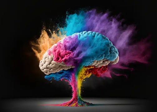 Colorful artistic brain with splashes of blue, purple, and orange, representing creative AI and graphic design.