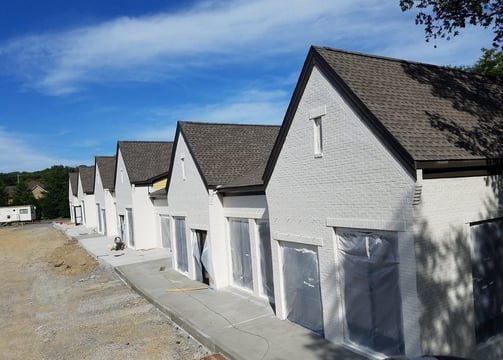 Painting and staining of brick on commercial property
