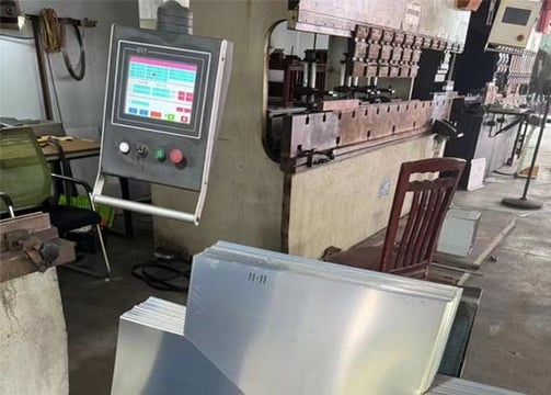 a hydraulic press-brake machine for material bending