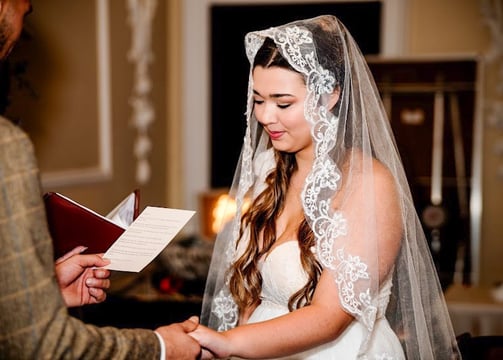 Groom reading his vows to his beautiful Hertfordshire bride