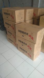 a pile of boxes with boxes of binchotan on them