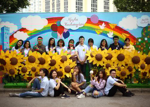 a group of people posing for a photo
