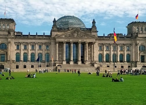 a large building with a large building in the background