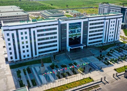 a large building with a large building in the background