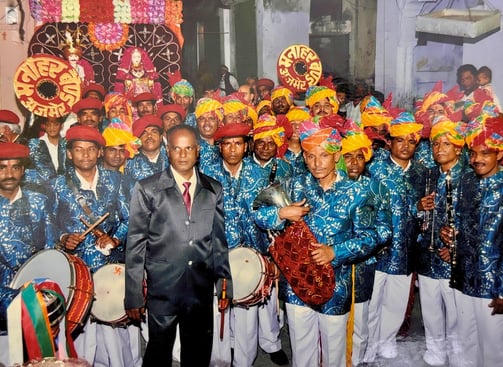 Manohar Brass Band in the old days with all crew members dressed well with instruments in Ajmer city.