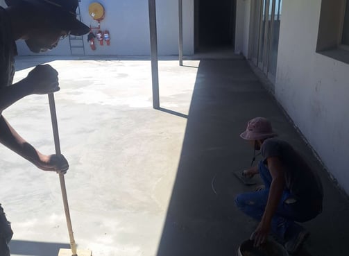 Floating surface area of specialized waterproofing screed application, Harbor Bay Mall, Simon"s Town, Cape Town