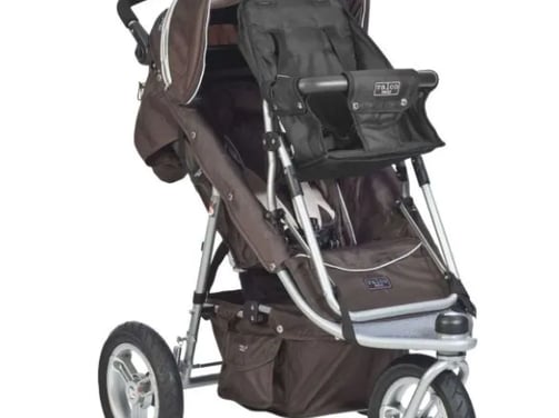 a baby stroller with a stroller and a stroller