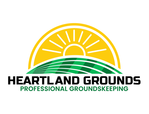 a logo for heartland grounds professional groundskeeping lawn care and snow removal service