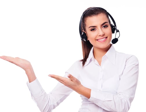 a woman in a white shirt and headphones holding a microphone