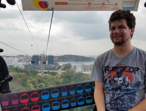 Steven enjoys the cable car ride over to Sentosa Island in Singapore