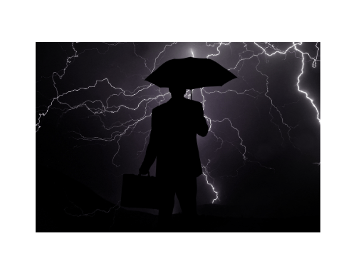 A person with an umbrella in a storm, symbolizing overcoming challenges