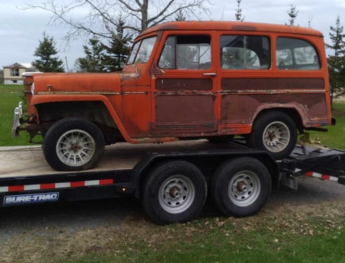 Car on a flatbed Trailer