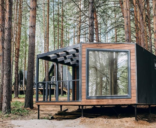 a tiny cabin in the woods. Modular house