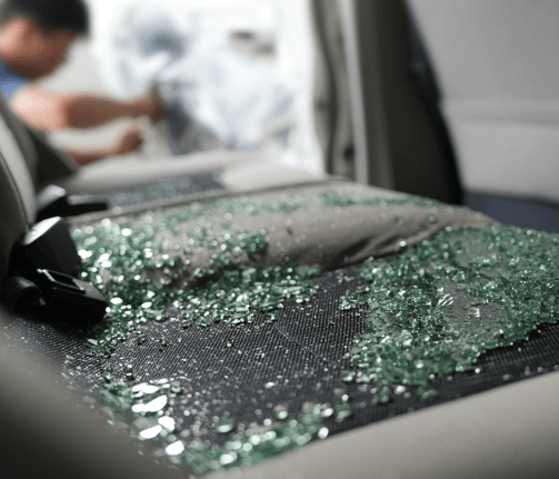 a car with a broken glass window