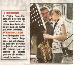 a boy playing saxophone and saxophone in a newspaper article