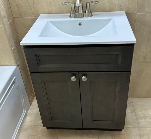 a bathroom sink with a white sink and a white sink