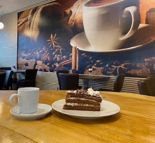 a piece of cake on a table in a restaurant