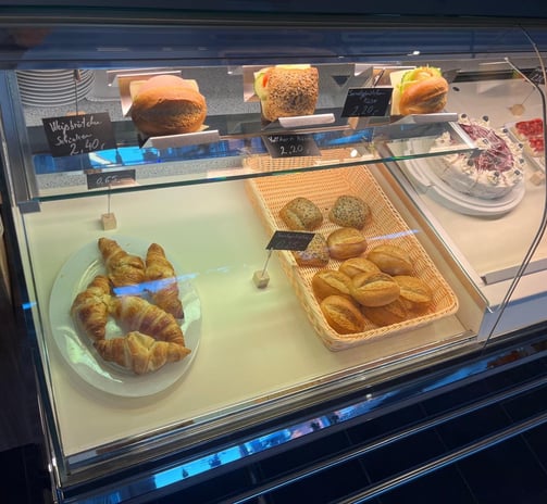 a display case with pastries of pastries and pastries
